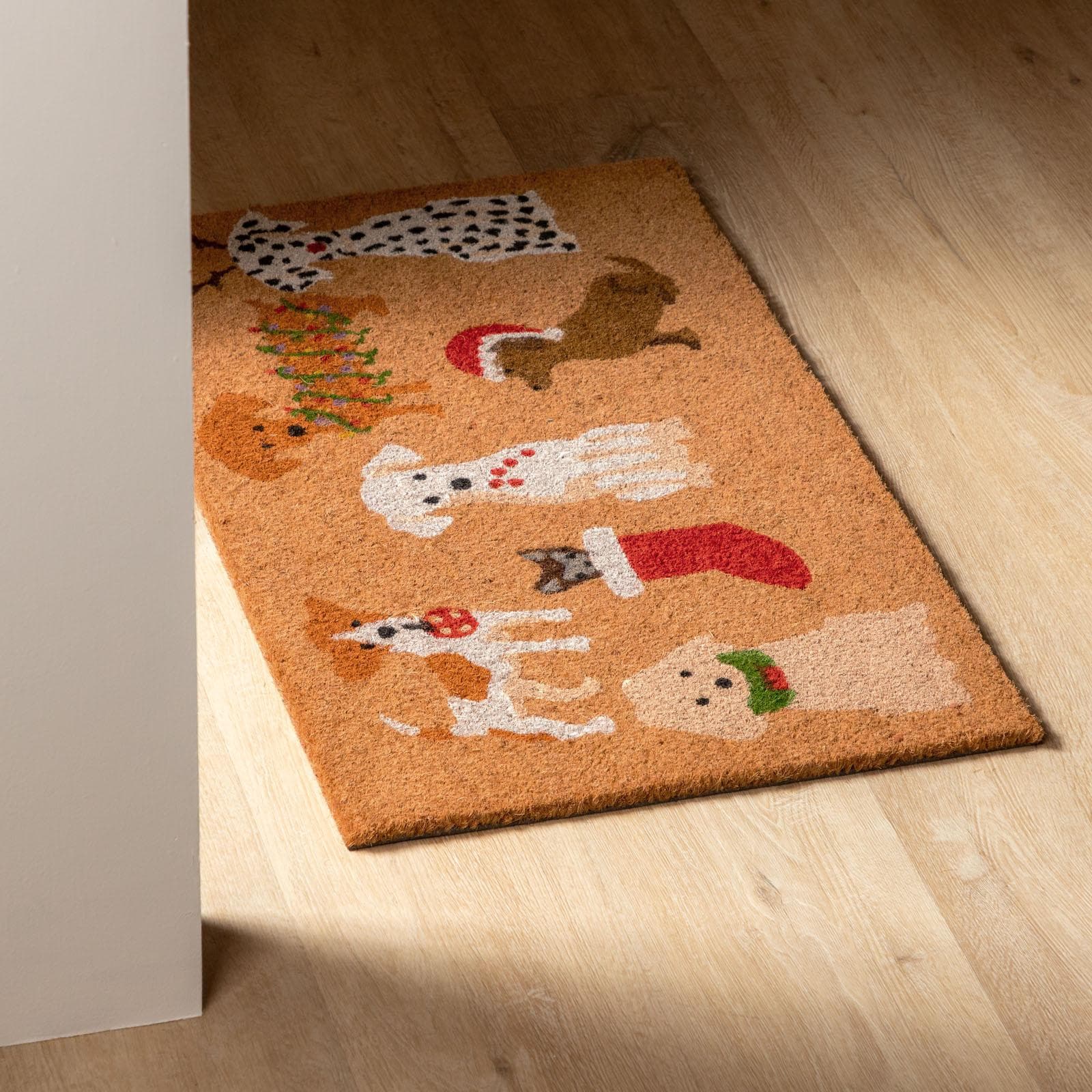 Zerbino natalizio 45x75 cm in coir con disegno cagnolini
